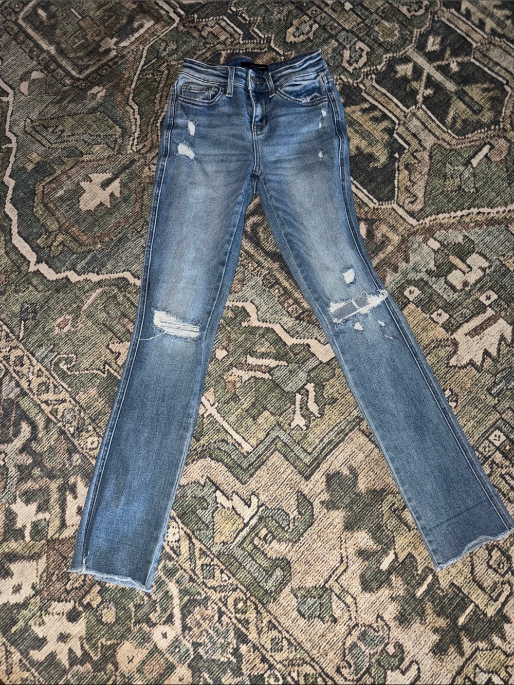 Women’s Distressed Light Blue Denim Jeans